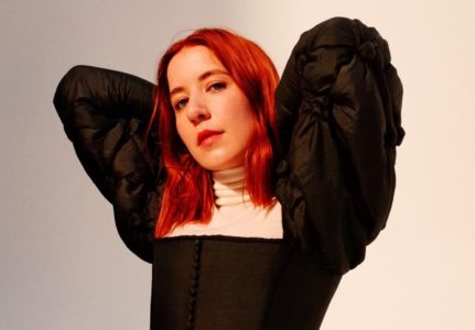 Multi-artist, Austra has returned with her new single and video for “Risk It.” On “Risk It”, she pitches her voice up over a chorus of brass instruments to capture