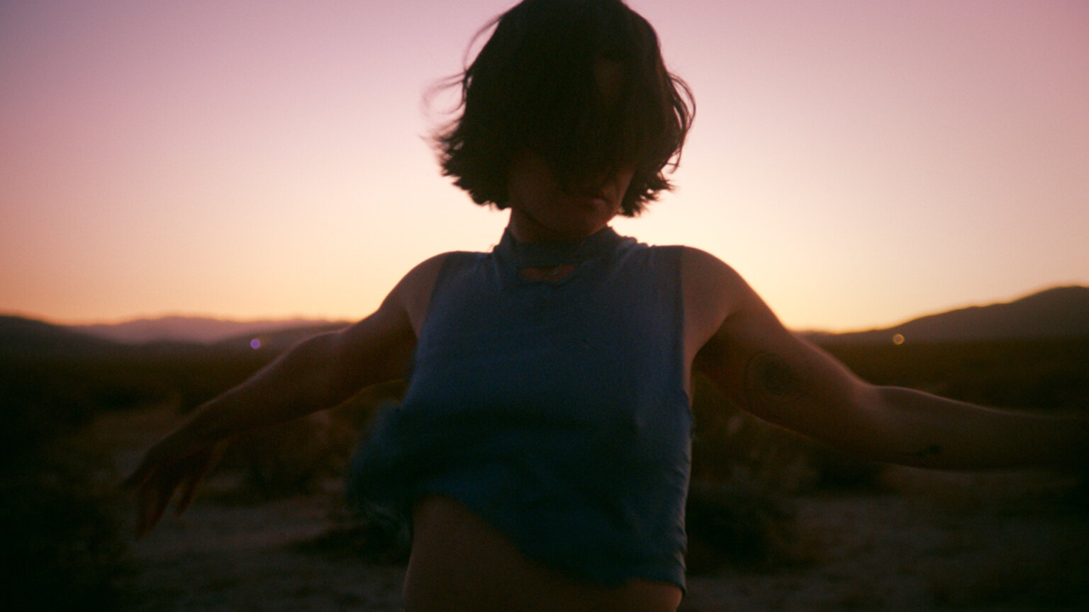 Singer/songwriter Adrianne Lenker (Big Thief) has shares a new, self-directed video for “forwards beckon rebound", the track is out via 4AD