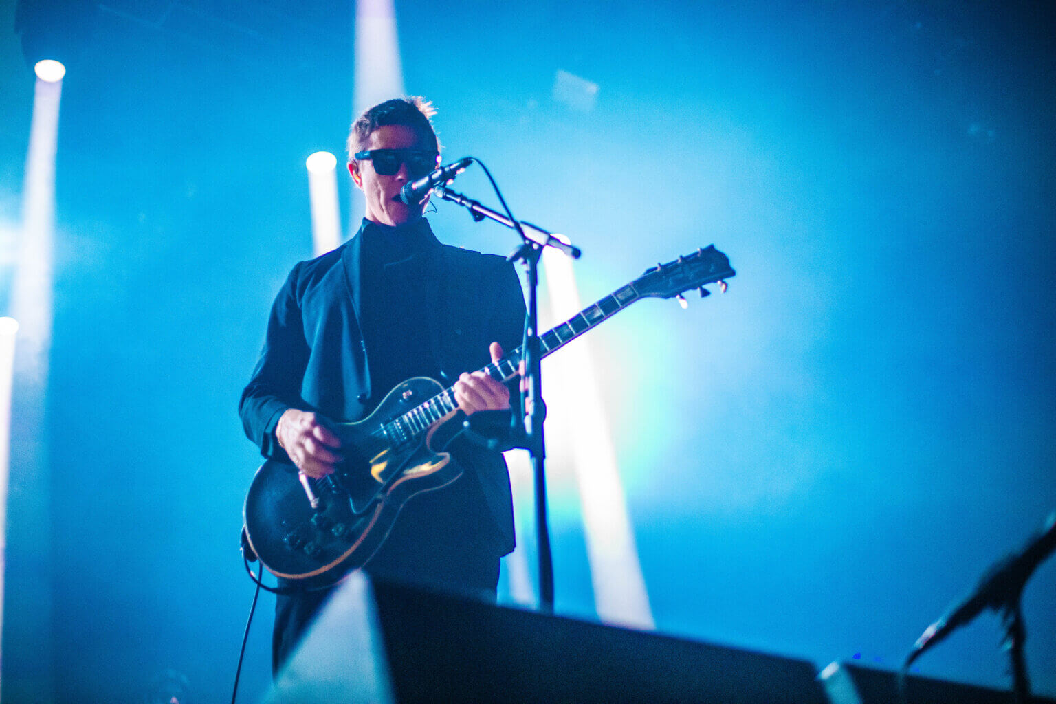 Live Review: Interpol Celebrates Antics 20th Anniversary in Chicago IL, at the Salt Shed on November 19th. Words and photos by Blake Correll