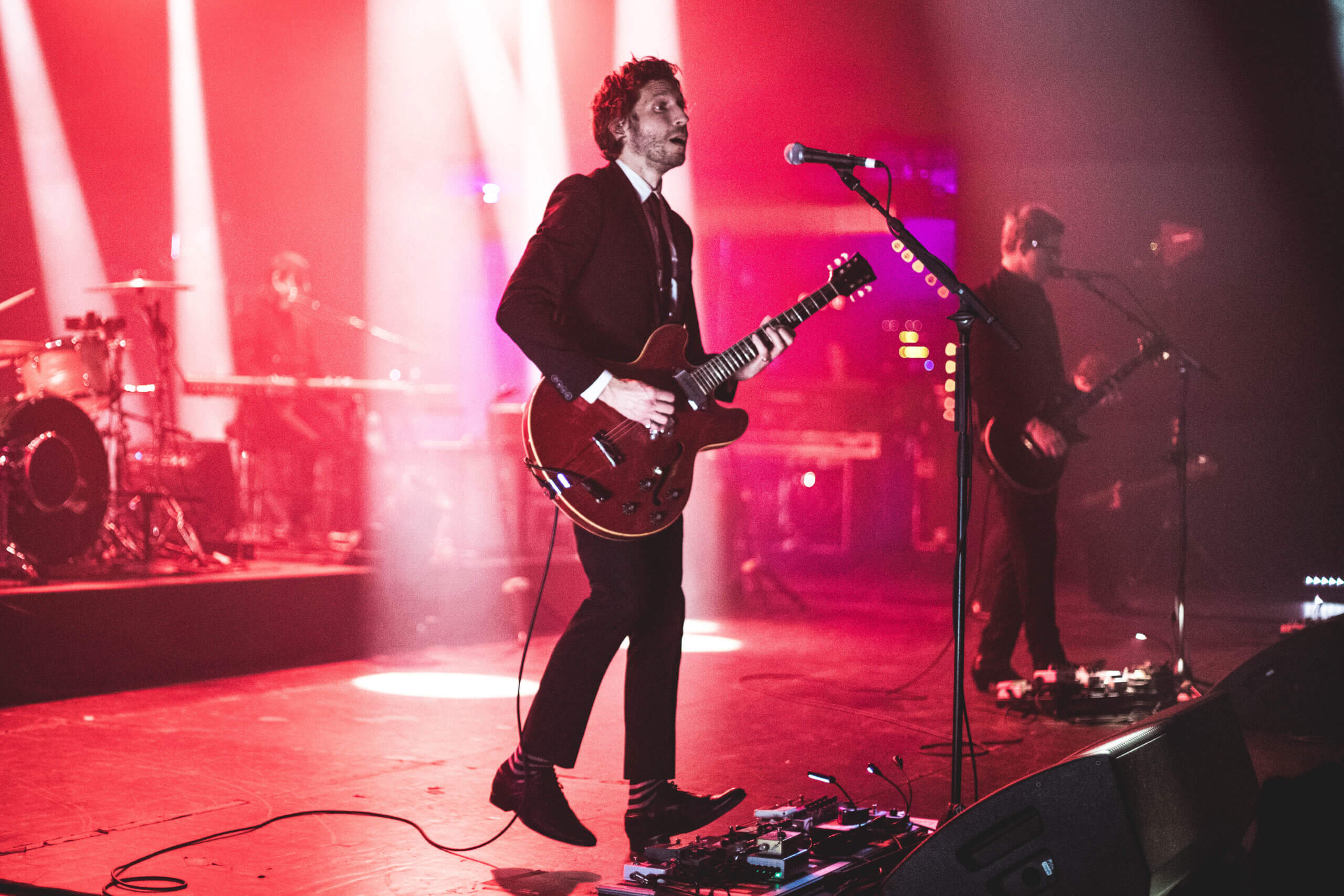 Live Review: Interpol Celebrates Antics 20th Anniversary in Chicago IL, at the Salt Shed on November 19th. Words and photos by Blake Correll