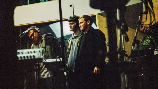 Damon Albarn & Grian Chatten and Kae Tempest debut "Flags." The track is off HELP(2), out March 6th via War Child Records
